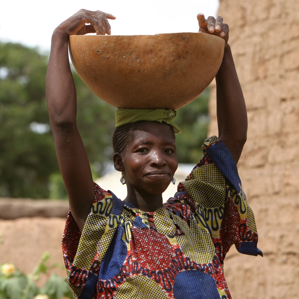 Mali woman with bowl
